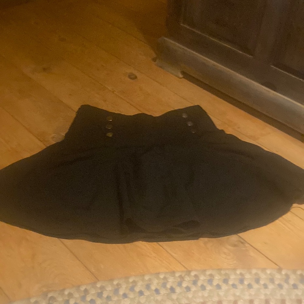 Adorable black sailor skirt with buttons.